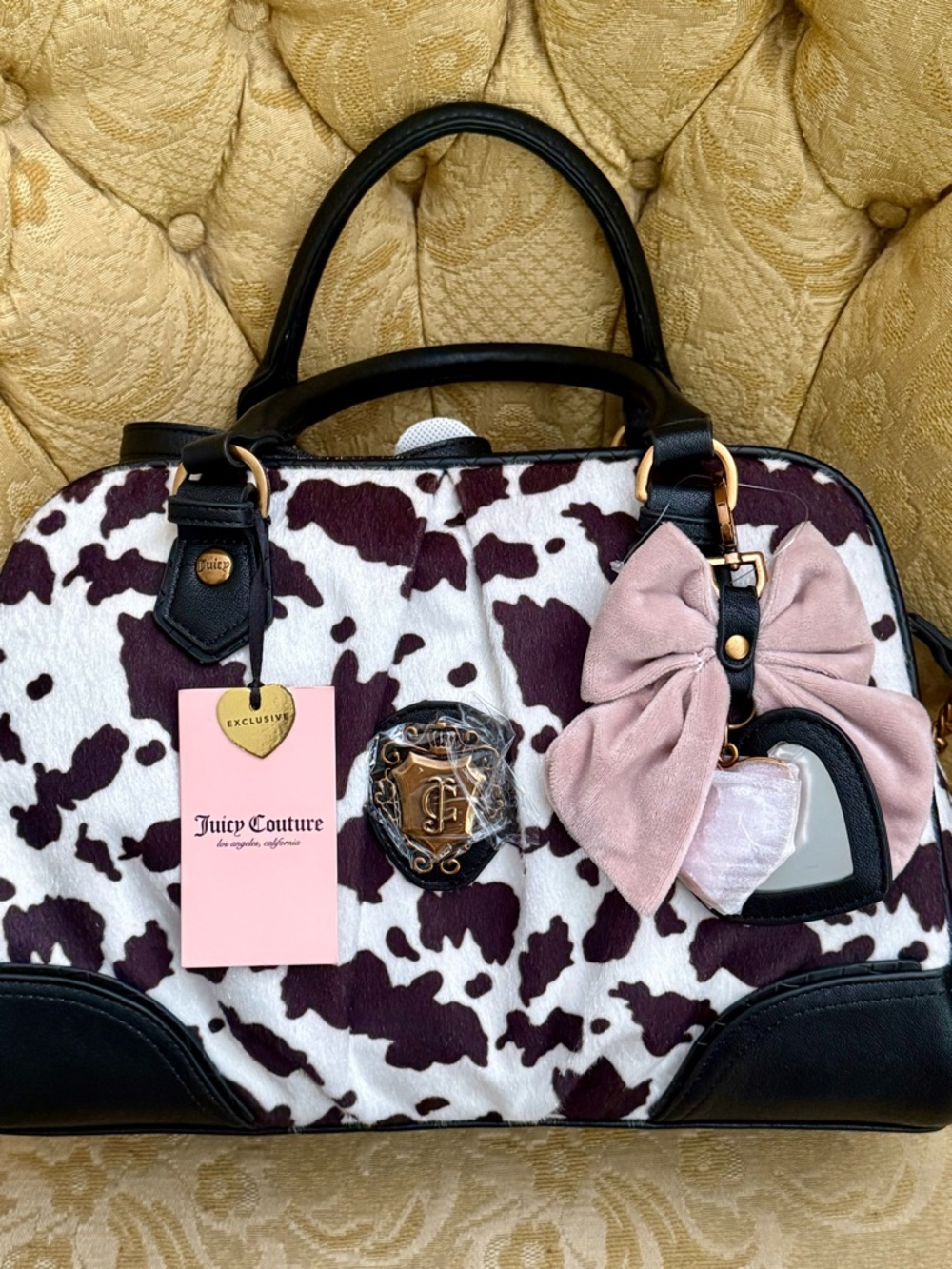 NWT Juicy Couture White and Dark Purple Cow-Print Satchel with Pink Bow Charm